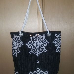 HANDBAG WITH MATCHING STORAGE BAG